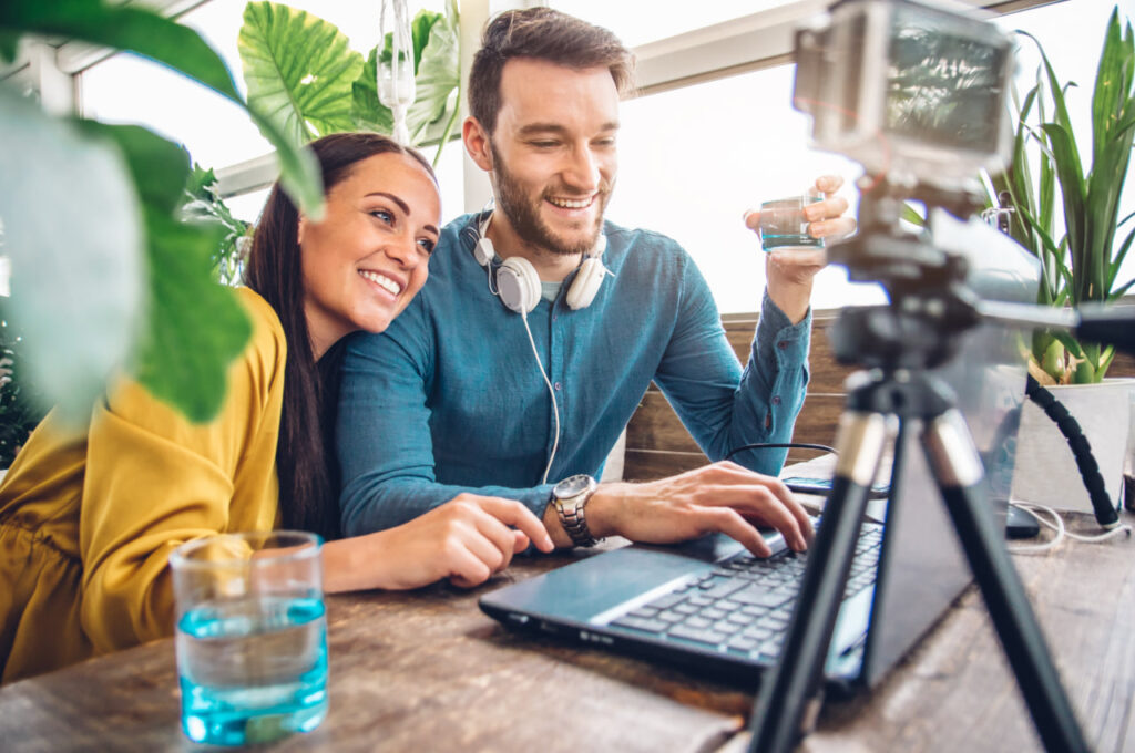  Young couple following online apartment hunting tips to vet rental home remotely.